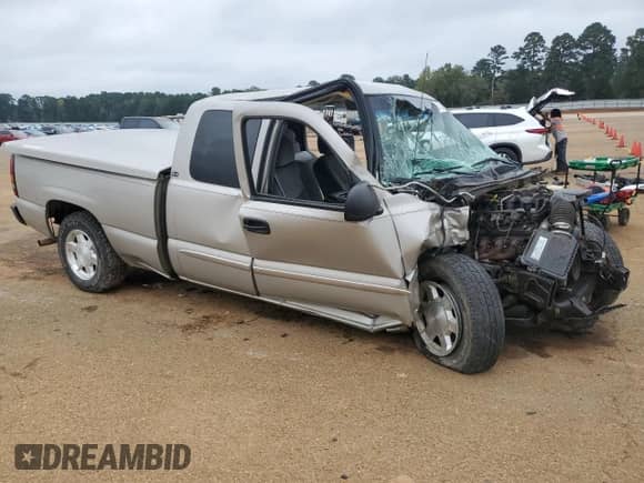 2007 GMC Sierra 1500 SLE1 with VIN 1GTEC19Z77Z162590, listed as a Copart auction lot 80102564 with Not provided miles and Salvage title. Bid and sale history available at DreamBid. Image 4.