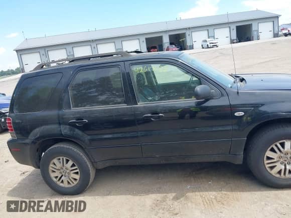 2005 Mercury Mariner Luxury with VIN 4M2CU56195DJ08478, listed as a IAAI auction lot 42617028 with 165,741 mi miles and . Bid and sale history available at DreamBid. Image 13.