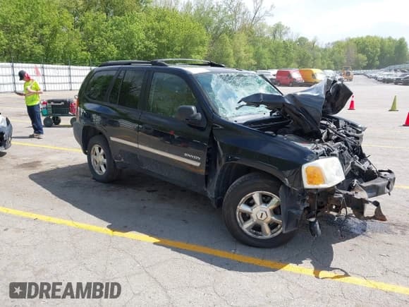 ✅ 2006 GMC Envoy SLE • VIN: 1GKDT13S562240769 • Lot: 42255973. Listed on IAAI with 183,423 mi. Free auction sales archive from the USA and detailed vehicle history report at DreamBid. Image 1.