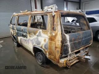 ✅ 1983 Volkswagen Vanagon GL • VIN: WV2ZB025XDH102750 • Lot: 77780184. Wystawiony na Copart z przebiegiem Nie podano. Bezpłatny archiwum sprzedaży aukcyjnych z USA i szczegółowy raport historii pojazdu na DreamBid. Zdjęcie 2.