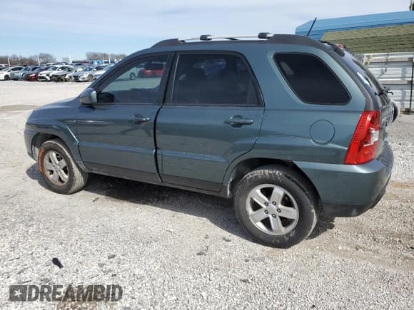 ✅ 2009 Kia Sportage EX • VIN: KNDJF723797619248 • Lot: 48122535. Wystawiony na Copart z przebiegiem 217 006 mil. Bezpłatny archiwum sprzedaży aukcyjnych z USA i szczegółowy raport historii pojazdu na DreamBid. Zdjęcie 2.