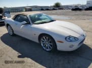 ✅ 2006 Jaguar XK XK8 • VIN: SAJDA42C662A46284 • Лот: 73175554. Опубликован ранее на Copart с пробегом 99 679 миль. Бесплатный доступ к архиву аукционных продаж из США и подробный отчёт об истории автомобиля на DreamBid. Изображение 4.
