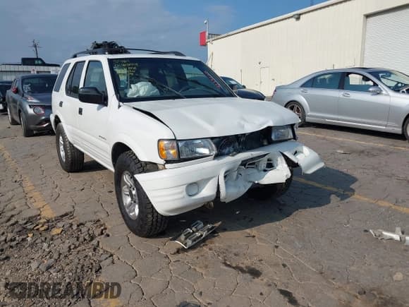 ✅ 2002 Isuzu Rodeo S • VIN: 4S2CK58W524321108 • Lot: 42352330. Listed on IAAI with 270,614 mi. Free auction sales archive from the USA and detailed vehicle history report at DreamBid. Image 1.