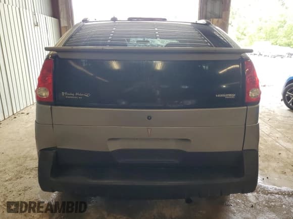 ✅ 2004 Pontiac Aztek • VIN: 3G7DB03E04S563310 • Lot: 63480025. Wystawiony na Copart z przebiegiem 104 308 mil. Bezpłatny archiwum sprzedaży aukcyjnych z USA i szczegółowy raport historii pojazdu na DreamBid. Zdjęcie 6.