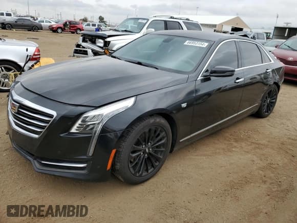 ✅ 2016 Cadillac CT6 RWD • VIN: 1G6KA5RX9GU166820 • Lot: 66953154. Listed on Copart with 106,054 mi. Free auction sales archive from the USA and detailed vehicle history report at DreamBid. Image 1.