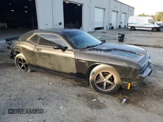 ✅ 2010 Dodge Challenger • VIN: 2B3CJ4DV6AH144240 • Lot: 45350735. Wystawiony na Copart z przebiegiem 188 668 mil. Bezpłatny archiwum sprzedaży aukcyjnych z USA i szczegółowy raport historii pojazdu na DreamBid. Zdjęcie 4.