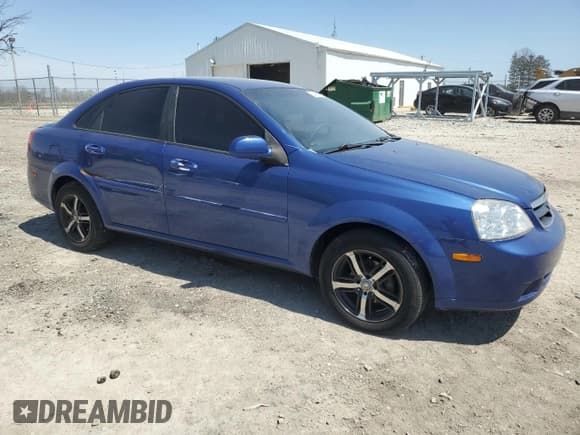 ✅ 2008 Suzuki Forenza • VIN: KL5JD56Z28K868230 • Lot: 53842425. Listed on Copart with 201,560 mi. Free auction sales archive from the USA and detailed vehicle history report at DreamBid. Image 4.