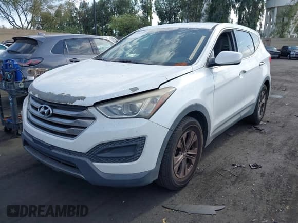 ✅ 2015 Hyundai Santa Fe • VIN: 5XYZTDLB9FG248463 • Лот: 43056598. Опубликован ранее на IAAI с пробегом 128 878 миль. Бесплатный доступ к архиву аукционных продаж из США и подробный отчёт об истории автомобиля на DreamBid. Изображение 2.