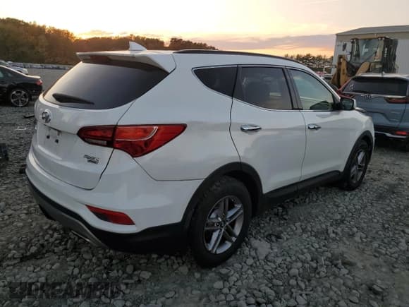 ✅ 2017 Hyundai Santa Fe 2.4L • VIN: 5NMZUDLB9HH016404 • Lot: 86643515. Listed on Copart with 73,795 mi. Free auction sales archive from the USA and detailed vehicle history report at DreamBid. Image 3.