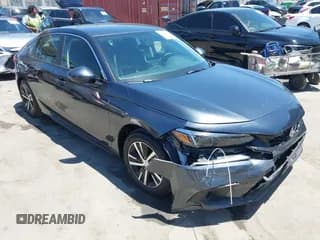 ✅ 2023 Honda Civic LX • VIN: 19XFL2H53PE013386 • Lot: 42702560. Listed on IAAI with 14,471 mi. Free auction sales archive from the USA and detailed vehicle history report at DreamBid. Image 1.