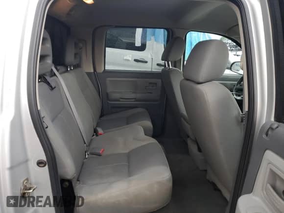 2006 Dodge Dakota SLT z VIN 1D7HW48N36S522858, wystawiony jako Copart lot #66431064 z przebiegiem 197 028 mil mil oraz Szkoda całkowita • Salvage title. Historia ofert i sprzedaży dostępna na DreamBid. Obrazek 10.