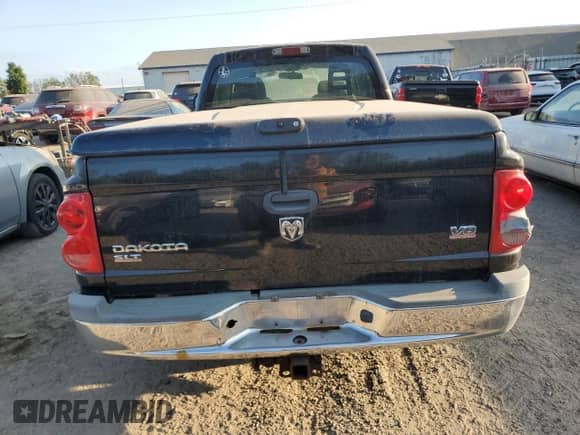 2005 Dodge Dakota SLT z VIN 1D7HW42N75S269518, wystawiony jako Copart lot #71501904 z przebiegiem 105 673 mil mil oraz Czysty tytuł • Clean title. Historia ofert i sprzedaży dostępna na DreamBid. Obrazek 6.