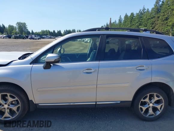✅ 2016 Subaru Forester Touring • VIN: JF2SJAXC4GH564016 • Lot: 42408444. Listed on IAAI with 34,506 mi. Free auction sales archive from the USA and detailed vehicle history report at DreamBid. Image 14.