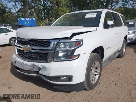 2015 Chevrolet Tahoe LT z VIN 1GNSKBKC3FR279459, wystawiony jako IAAI lot #43349972 z przebiegiem 112 043 mil mil oraz . Historia ofert i sprzedaży dostępna na DreamBid. Obrazek 6.