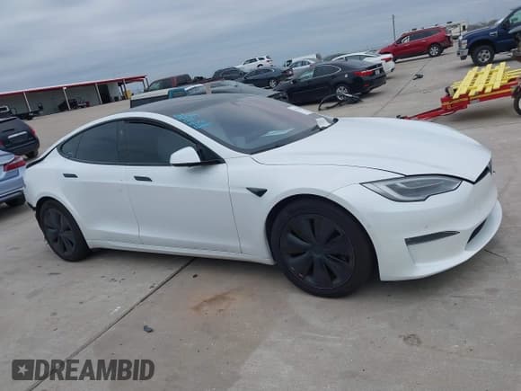 ✅ 2021 Tesla Model S Plaid • VIN: 5YJSA1E64MF452744 • Lot: 41375136. Listed on IAAI with Not provided. Free auction sales archive from the USA and detailed vehicle history report at DreamBid. Image 12.