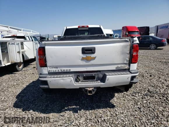2016 Chevrolet Silverado 3500HD High Country с VIN 1GC4K1E88GF123326, выставлен на аукционе Copart как лот 59619625 с пробегом 133 596 миль миль и Списание • Salvage title. История ставок и продаж доступна на DreamBid. Изображение 6.
