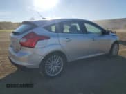 ✅ 2014 Ford Focus Titanium • VIN: 1FADP3N20EL383622 • Lot: 82553195. Listed on Copart with 91,901 mi. Free auction sales archive from the USA and detailed vehicle history report at DreamBid. Image 3.