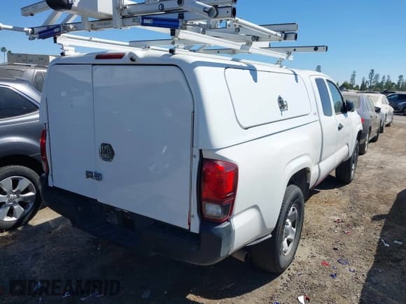 ✅ 2021 Toyota Tacoma SR • VIN: 3TYRX5GN5MT010273 • Lot: 42877949. Listed on IAAI with 60,321 mi. Free auction sales archive from the USA and detailed vehicle history report at DreamBid. Image 4.