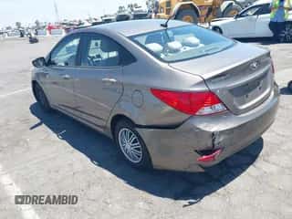 2014 Hyundai Accent GLS with VIN KMHCT4AE8EU655136, listed as a IAAI auction lot 42797016 with 102,554 mi miles and . Bid and sale history available at DreamBid. Image 3.