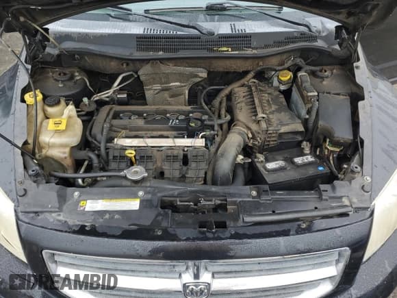 ✅ 2010 Dodge Caliber SXT • VIN: 1B3CB4HA4AD571112 • Лот: 83348964. Опубликован ранее на Copart с пробегом 276 786 миль. Бесплатный доступ к архиву аукционных продаж из США и подробный отчёт об истории автомобиля на DreamBid. Изображение 12.