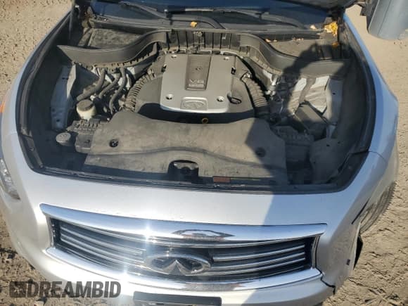 ✅ 2015 Infiniti QX70 • VIN: JN8CS1MW9FM482016 • Lot: 91623355. Listed on Copart with 126,685 mi. Free auction sales archive from the USA and detailed vehicle history report at DreamBid. Image 12.