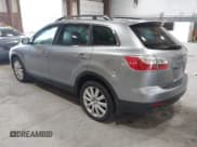 ✅ 2010 Mazda CX-9 Touring • VIN: JM3TB3MVXA0216459 • Lot: 42228913. Wystawiony na IAAI z przebiegiem 183 259 mil. Bezpłatny archiwum sprzedaży aukcyjnych z USA i szczegółowy raport historii pojazdu na DreamBid. Zdjęcie 3.