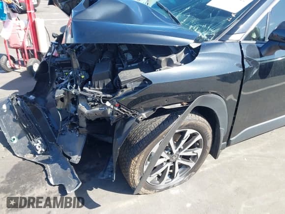 ✅ 2023 Toyota Corolla Cross XLE • VIN: 7MUEAAAGXPV065844 • Лот: 43357622. Опубликован ранее на IAAI с пробегом 43 099 миль. Бесплатный доступ к архиву аукционных продаж из США и подробный отчёт об истории автомобиля на DreamBid. Изображение 19.