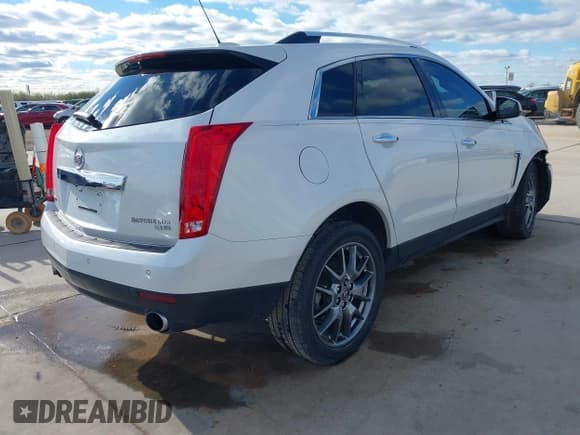 ✅ 2016 Cadillac SRX Performance Collection • VIN: 3GYFNCE39GS565215 • Lot: 41318743. Listed on IAAI with 46,063 mi. Free auction sales archive from the USA and detailed vehicle history report at DreamBid. Image 4.