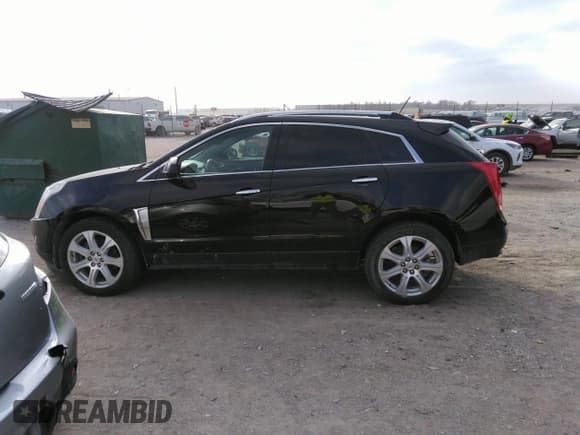 ✅ 2016 Cadillac SRX Performance Collection • VIN: 3GYFNCE32GS505552 • Lot: 40949642. Listed on IAAI with 143,343 mi. Free auction sales archive from the USA and detailed vehicle history report at DreamBid. Image 14.