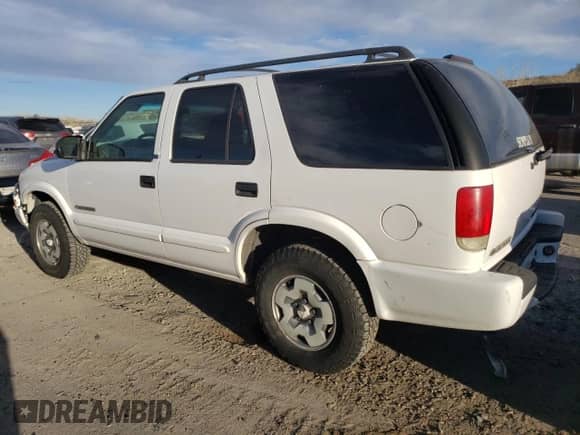 2003 Chevrolet Blazer LS z VIN 1GNDT13X33K136937, wystawiony jako Copart lot #80944284 z przebiegiem 163 549 mil mil oraz Szkoda całkowita • Salvage title. Historia ofert i sprzedaży dostępna na DreamBid. Obrazek 2.