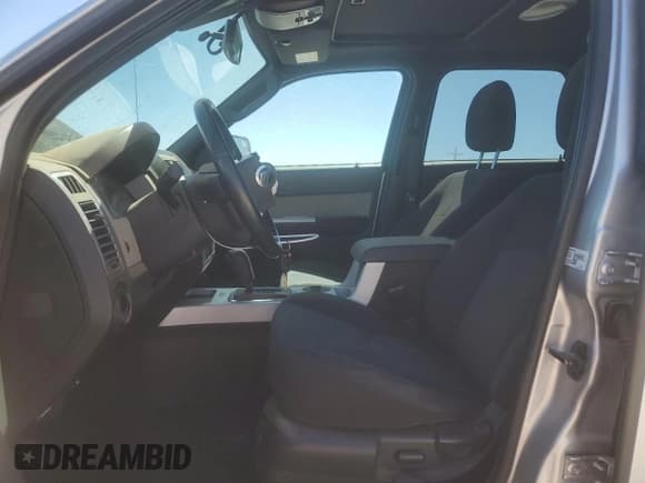 ✅ 2011 Mercury Mariner • VIN: 4M2CN9BG1BKJ01885 • Lot: 50394765. Listed on Copart with 169,173 mi. Free auction sales archive from the USA and detailed vehicle history report at DreamBid. Image 7.