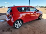 ✅ 2012 Chevrolet Sonic LTZ • VIN: 1G1JE6SH3C4167034 • Lot: 86705675. Listed on Copart with 105,702 mi. Free auction sales archive from the USA and detailed vehicle history report at DreamBid. Image 3.