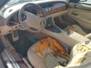 ✅ 1998 Jaguar XK • VIN: SAJGX2245WC027810 • Лот: 70329715. Опубликован ранее на Copart с пробегом Не указан. Бесплатный доступ к архиву аукционных продаж из США и подробный отчёт об истории автомобиля на DreamBid. Изображение 8.