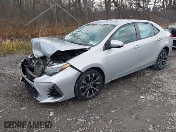 ✅ 2018 Toyota Corolla LE • VIN: 2T1BURHE7JC972588 • Lot: 43714956. Listed on IAAI with 144,977 mi. Free auction sales archive from the USA and detailed vehicle history report at DreamBid. Image 2.