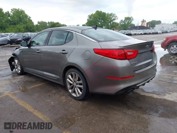 ✅ 2014 Kia Optima SXL Turbo • VIN: 5XXGR4A68EG303094 • Lot: 42207175. Listed on IAAI with 105,521 mi. Free auction sales archive from the USA and detailed vehicle history report at DreamBid. Image 3.