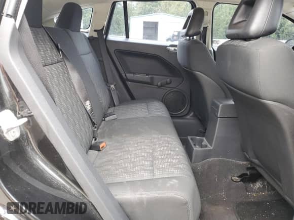 2009 Dodge Caliber SE z VIN 1B3HB28A19D152169, wystawiony jako Copart lot #74137824 z przebiegiem 99 595 mil mil oraz Czysty tytuł • Clean title. Historia ofert i sprzedaży dostępna na DreamBid. Obrazek 11.