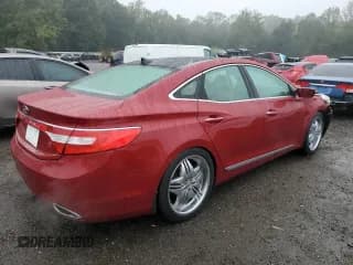 ✅ 2013 Hyundai Azera • VIN: KMHFH4JG1DA328688 • Лот: 81057915. Опубликован ранее на Copart с пробегом 129 878 миль. Бесплатный доступ к архиву аукционных продаж из США и подробный отчёт об истории автомобиля на DreamBid. Изображение 3.