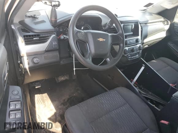 ✅ 2015 Chevrolet Tahoe Commercial • VIN: 1GNLC2EC0FR636271 • Lot: 77180784. Listed on Copart with 132,037 mi. Free auction sales archive from the USA and detailed vehicle history report at DreamBid. Image 8.