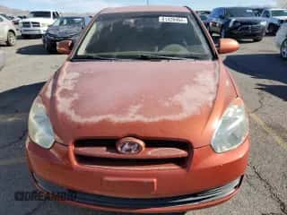 2007 Hyundai Accent GS z VIN KMHCM36CX7U004155, wystawiony jako Copart lot #81428464 z przebiegiem 98 761 mil mil oraz Czysty tytuł • Clean title. Historia ofert i sprzedaży dostępna na DreamBid. Obrazek 5.
