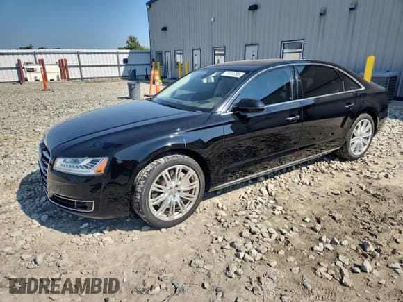 ✅ 2015 Audi A8 4.0T • VIN: WAU32AFD8FN037989 • Лот: 71414795. Опубликован ранее на Copart с пробегом 98 189 миль. Бесплатный доступ к архиву аукционных продаж из США и подробный отчёт об истории автомобиля на DreamBid. Изображение 1.