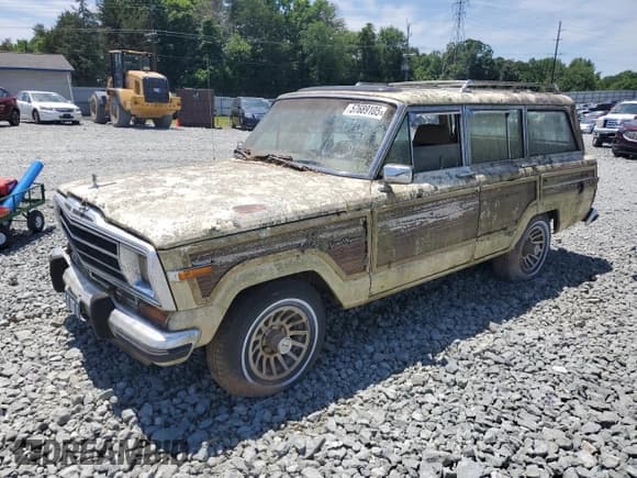 ✅ 1988 Jeep Grand Wagoneer • VIN: 1JCNJ15U3JT159548 • Lot: 57689105. Wystawiony na Copart z przebiegiem 146 992 mil. Bezpłatny archiwum sprzedaży aukcyjnych z USA i szczegółowy raport historii pojazdu na DreamBid. Zdjęcie 1.