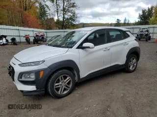 ✅ 2021 Hyundai Kona SE • VIN: KM8K1CAA4MU718515 • Лот: 86276245. Опубликован ранее на Copart с пробегом 91 252 миль. Бесплатный доступ к архиву аукционных продаж из США и подробный отчёт об истории автомобиля на DreamBid. Изображение 1.