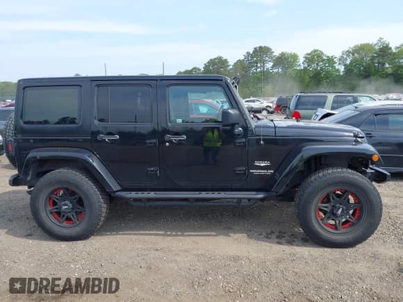 ✅ 2007 Jeep Wrangler Unlimited Sahara • VIN: 1J4GA59187L178391 • Lot: 42422715. Listed on IAAI with 134,256 mi. Free auction sales archive from the USA and detailed vehicle history report at DreamBid. Image 13.