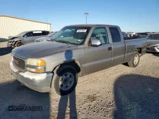 1999 GMC Sierra 1500 SLE1 with VIN 1GTEC19V5XZ527605, listed as a Copart auction lot 80678894 with 174,310 mi miles and Clean title. Bid and sale history available at DreamBid. Image 1.