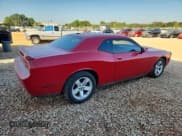 ✅ 2012 Dodge Challenger SXT • VIN: 2C3CDYAG7CH167519 • Lot: 84876065. Listed on Copart with 191,271 mi. Free auction sales archive from the USA and detailed vehicle history report at DreamBid. Image 3.