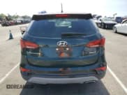 ✅ 2018 Hyundai Santa Fe 2.4L • VIN: 5NMZT3LB6JH098160 • Лот: 65944304. Опубликован ранее на Copart с пробегом 101 051 миль. Бесплатный доступ к архиву аукционных продаж из США и подробный отчёт об истории автомобиля на DreamBid. Изображение 6.