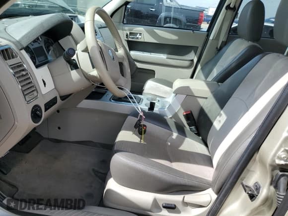 ✅ 2011 Mercury Mariner Premier • VIN: 4M2CN8HG3BKJ06796 • Lot: 66446235. Listed on Copart with 92,834 mi. Free auction sales archive from the USA and detailed vehicle history report at DreamBid. Image 7.