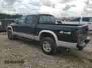 2003 Dodge Dakota SLT z VIN 1D7HG48N43S267503, wystawiony jako Copart lot #73586474 z przebiegiem 143 042 mil mil oraz Szkoda całkowita • Salvage title. Historia ofert i sprzedaży dostępna na DreamBid. Obrazek 2.