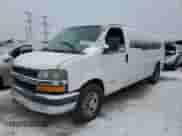 2013 Chevrolet Express Passenger LT с VIN 1GAZG1FG5D1153320, выставлен на аукционе Copart как лот 88986785 с пробегом Не указан миль и Списание • Salvage title. История ставок и продаж доступна на DreamBid. Изображение 1.