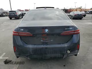 ✅ 2024 BMW i5 eDrive40 • VIN: WBY33FK03RCR93119 • Лот: 76124194. Опубликован ранее на Copart с пробегом Не указан. Бесплатный доступ к архиву аукционных продаж из США и подробный отчёт об истории автомобиля на DreamBid. Изображение 6.
